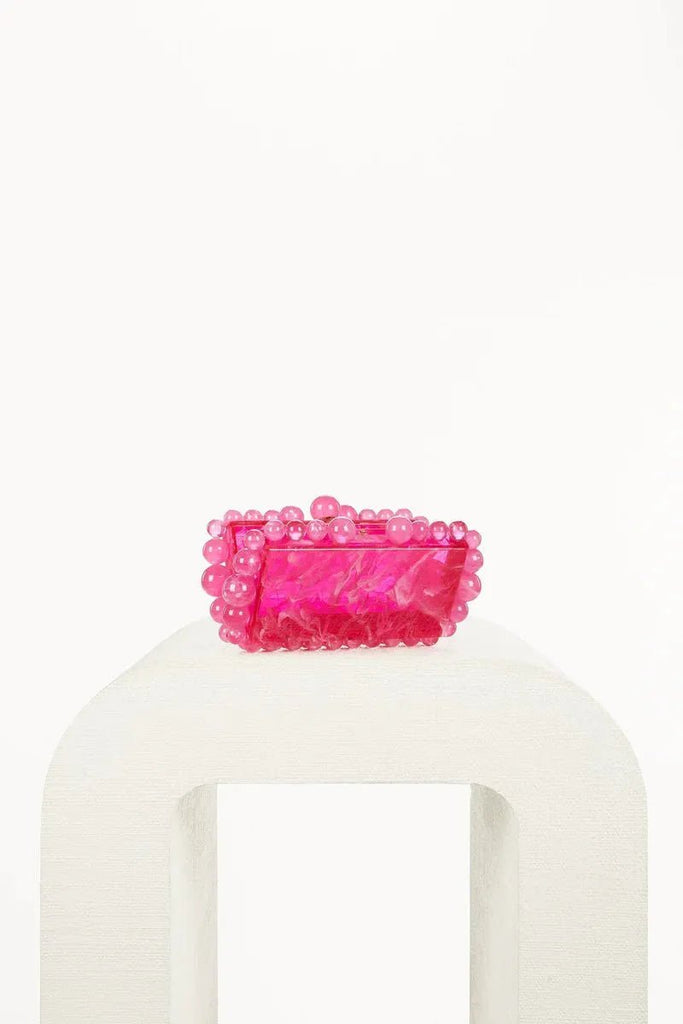 Rent RENT Cult Gaia Eos Clutch Qajar Rose (RRP £340) – designer dress hire in UK sizes 8–16 from One Hit Wonders