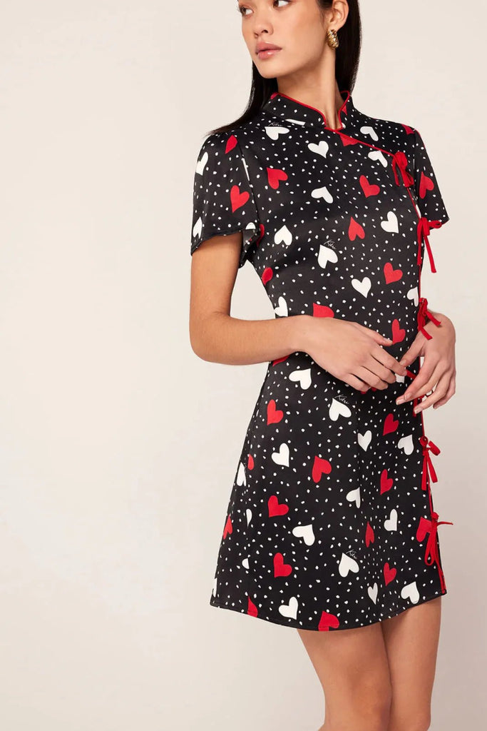 Rent RENT Kitri Harlow Red Heart Print Mini Dress (RRP £140) – designer dress hire in UK sizes 8–16 from One Hit Wonders