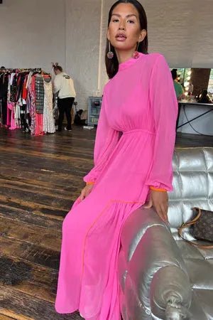 Rent RENT Never Fully Dressed Pink Alesha Dress (RRP £99) – designer dress hire in UK sizes 8–16 from One Hit Wonders