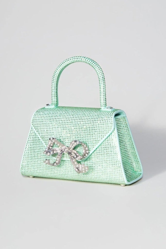 Rent RENT Self Portrait Aqua Rhinestone Bow Envelope Mini Bag (RRP £400) – designer dress hire in UK sizes 8–16 from One Hit Wonders