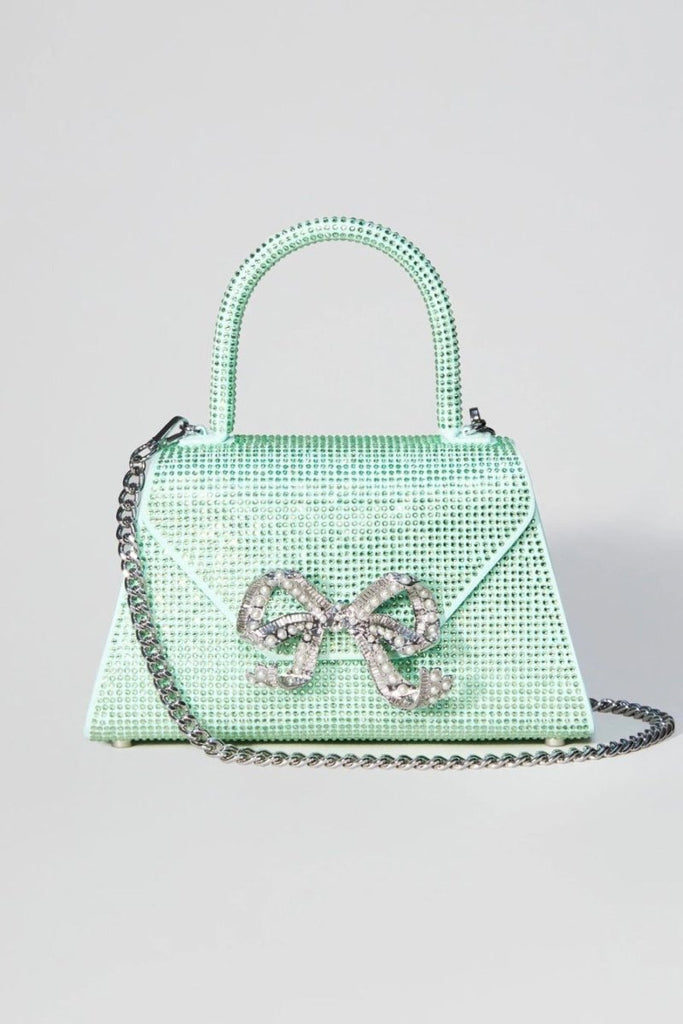 Rent RENT Self Portrait Aqua Rhinestone Bow Envelope Mini Bag (RRP £400) – designer dress hire in UK sizes 8–16 from One Hit Wonders