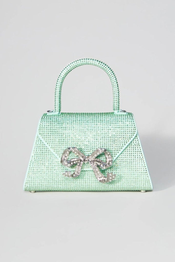 Rent RENT Self Portrait Aqua Rhinestone Bow Envelope Mini Bag (RRP £400) – designer dress hire in UK sizes 8–16 from One Hit Wonders