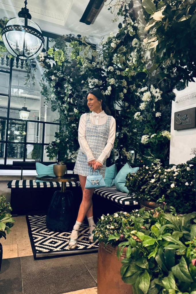 Rent RENT Self Portrait Blue Rhinestone Bow Envelope Mini Bag (RRP £400) – designer dress hire in UK sizes 8–16 from One Hit Wonders
